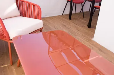 a glass table and chairs in a room at Navona Penthouse - Attico Vista Cupola 4 posti in Rome