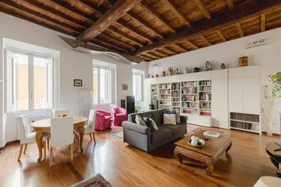 a living room with a couch and a table at Giusi Trevi Apartment in Rome