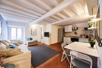a living room with a couch and a table at iFlat Wonderful Home in Monti in Rome