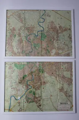 two pictures of a map in a white frame at Casa Esquilina in Rome