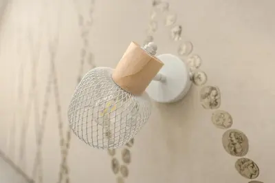 a roll of toilet paper hanging from a door knob at B&B Toto al Vaticano in Rome