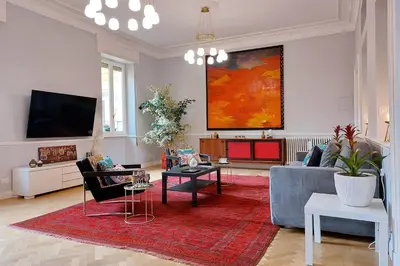 a living room with a couch and a tv at LuxuryTerrace RomeApartment in Rome
