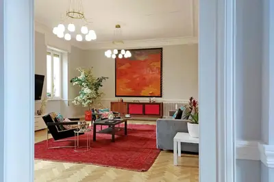 a living room with a couch and a table at LuxuryTerrace RomeApartment in Rome