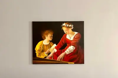 a painting of a woman and a child on a wall at Atelier dello Statuto, a few steps from Colosseo in Rome