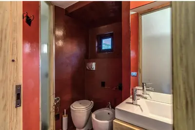 a bathroom with a toilet and a sink at Suite San Calisto Trastevere - by romanhouseit in Rome