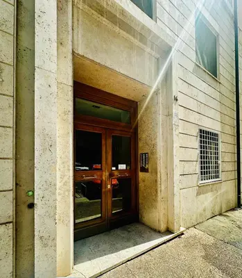 an entrance to a building with a wooden door at Podesti House - Flaminio Stadio Olimpico in Rome