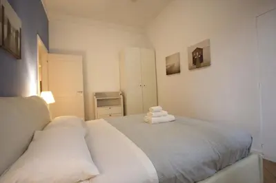 a bedroom with two beds with towels on them at Testaccio Holiday House in Rome