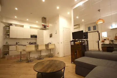 a living room with a couch and a table at Testaccio Holiday House in Rome