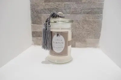 a candle in a window with a scarf around it at TrastevereLoft228 Apt. WHITE in Rome