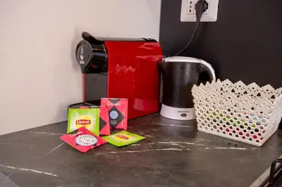 a counter top with a coffee maker and a toaster at Salotti 15 in Rome