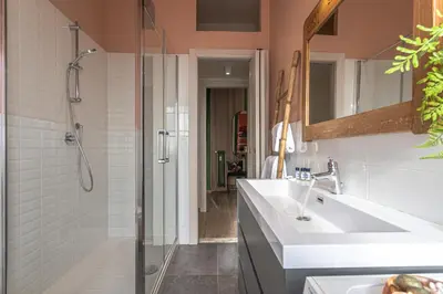 a bathroom with a sink and a shower at Viola Penthouse with Rome Panoramic View in Rome