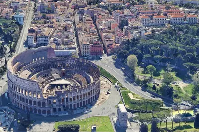 an aerial view of the colosseum and theatican city at ht bilo colosseo in Rome
