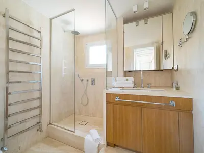 a bathroom with a shower and a sink and a mirror at LUXURY Terrazza Privata su Fontana di Trevi in Rome