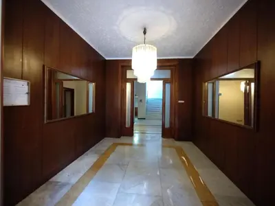 a hallway with wooden walls and a ceiling with mirrors at La Casa nel Parco - Stadio Olimpico, Auditorium con posto auto in Rome