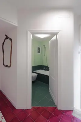 a bathroom with a toilet and a bath tub at Modern pied a terre near Piazza Navona in Rome