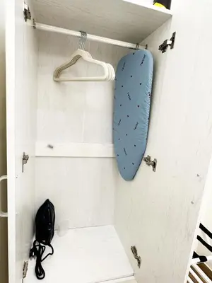 a sleeping bag is hanging in a closet at MUSEUM DAY VATICAN in Rome