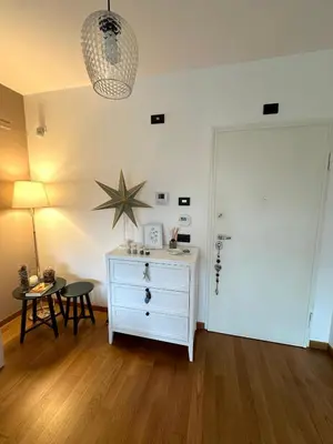 a room with a white dresser and a star on the wall at Hygge Studio in Rome