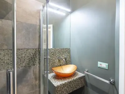 a bathroom with a bowl sink in a shower at Apartment Porta Magica by Interhome in Rome