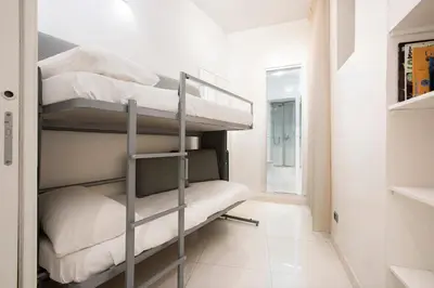 a bunk bed room with two bunk beds at Angelique Boutique in Rome