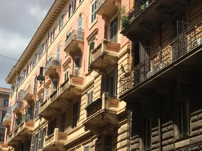 a building with balconies on the side of it at Casa Vacanza Colosseo in Rome