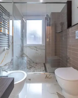 a bathroom with a sink and a toilet and a shower at 42 Gandino Superior in Rome