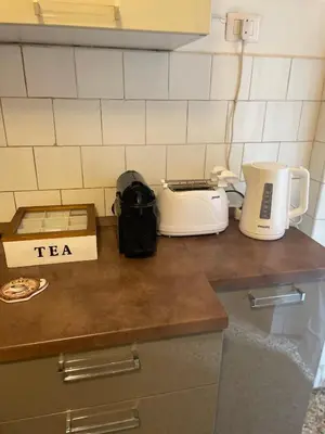 a kitchen counter with a toaster and a toaster at Ila Guest House in Rome