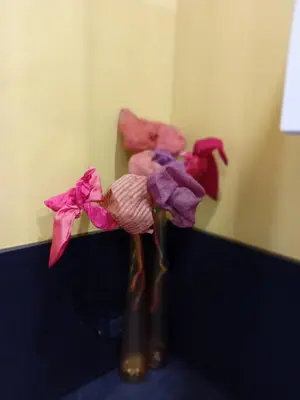 a vase filled with pink and purple flowers at Tre Fiori in Rome