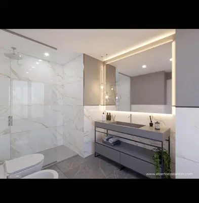 a bathroom with a sink and a toilet and a mirror at Adelaide Suite Dreams in Rome