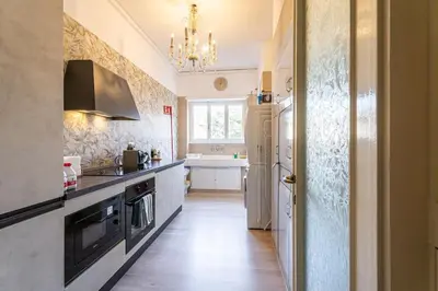 a kitchen with a sink and a stove at BigFamilyRome-Vatican&Aurelio in Rome