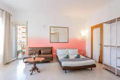 a living room with a couch and a table at BigFamilyRome-Vatican&Aurelio in Rome