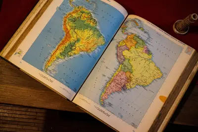 an open book with a map of united states at DGVatican in Rome
