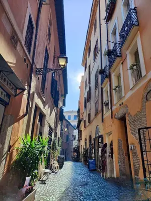 an alley in an old town with buildings at R22 Apartment in Rome