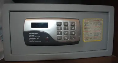a microwave oven with a remote control in it at Funny Palace Hostel in Rome