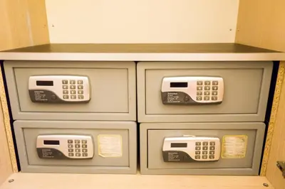 a telephone booth with pay phones and fax machines at Funny Palace Hostel in Rome