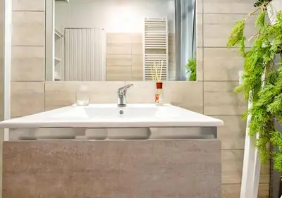 a bathroom with a sink and a mirror at 