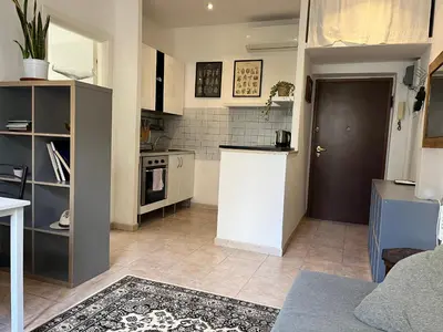 a small kitchen with a counter in a room at Appartamento S. Pietro in Rome