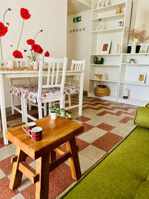 a living room with two chairs and a table at Holiday Homes Rome - Monte Verde 61 - near Trastevere in Rome