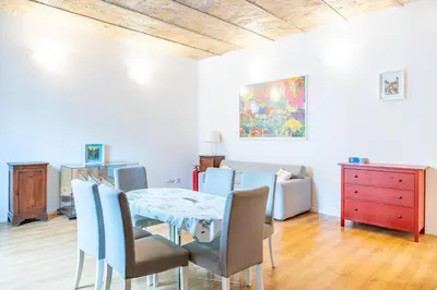 a dining room with a table and chairs at Lion 99 in Rome