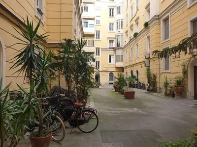 a group of bikes parked next to a building at 111 ColaDiRienzo Rooms - by AD Roma in Rome