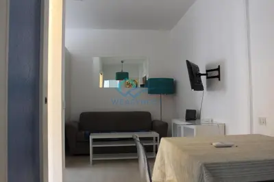 a living room with a couch and a table at Cozy Haven near Caracalla Baths Your Home in San Giovanni in Rome
