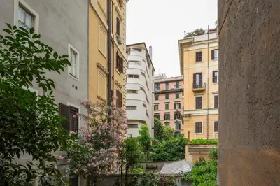 a group of buildings in a city with a tree at Prati Zen Boutique Studio-ZEN37 in Rome