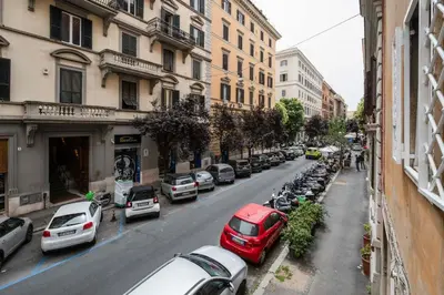 a street with cars parked on the side of the road at Prati Zen Boutique Studio-ZEN37 in Rome