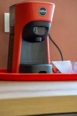 a red router sitting on top of a table at Little Red Apartment in Rome