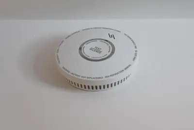 a white frisbee sitting on top of a table at Little Red Apartment in Rome