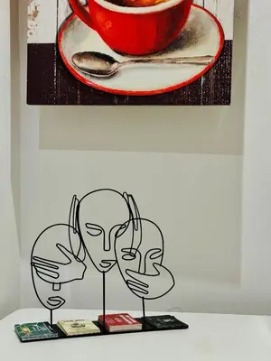 a painting of two people with their hands in front of a plate at Suite Castelfidardo 50 in Rome