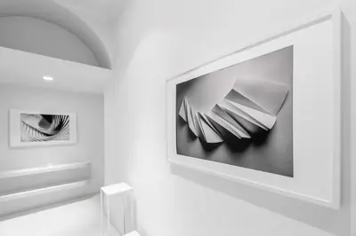 a white room with a tv on a wall at Luxury White in Rome