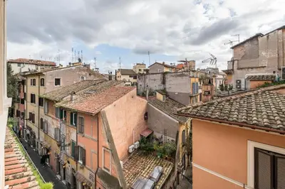 an aerial view of a city with buildings at La Gatta De Lisa in Rome