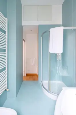 a bathroom with a glass shower and a toilet at Via G. Ferrari Private Apartment in Rome