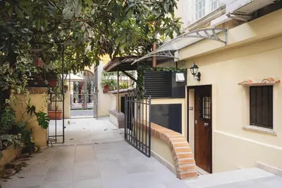 an entrance to a building with a gate at Domus Mariani - Cremera by Ghor in Rome
