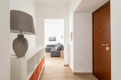 a living room with a vase sitting on a counter at LoveRhome Apartment 2 in Rome